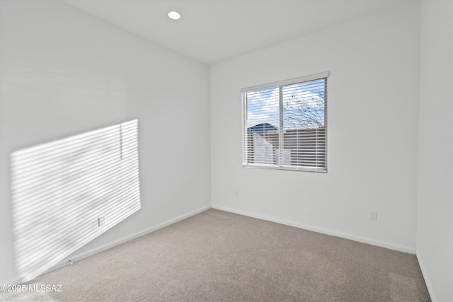 7797 S Indian Wheat Way, Tucson, AZ 85747 - unfurnished room with carpet flooring, baseboards, and recessed lighting