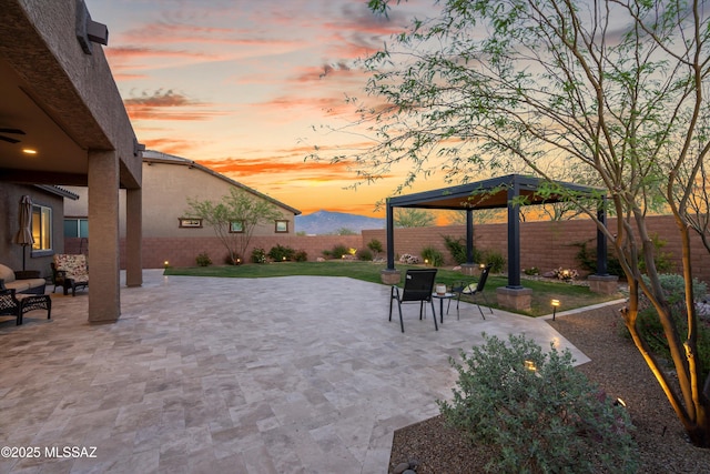 view of patio / terrace featuring a gazebo and a fenced backyard