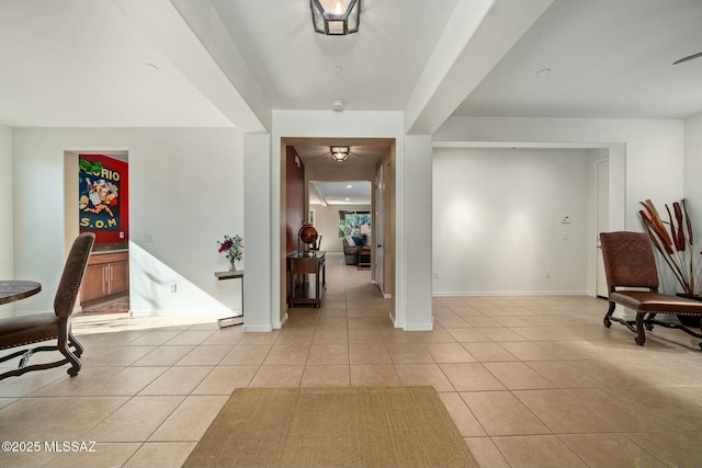 12487 N Wind Runner Pkwy, Marana, AZ 85658 - foyer entrance featuring light tile patterned floors and baseboards