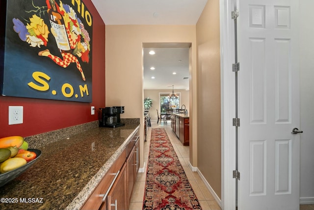 12487 N Wind Runner Pkwy, Marana, AZ 85658 - hall with light tile patterned floors, baseboards, and recessed lighting