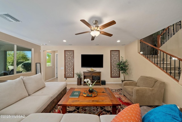12487 N Wind Runner Pkwy, Marana, AZ 85658 - living area featuring stairs, a ceiling fan, recessed lighting, and baseboards