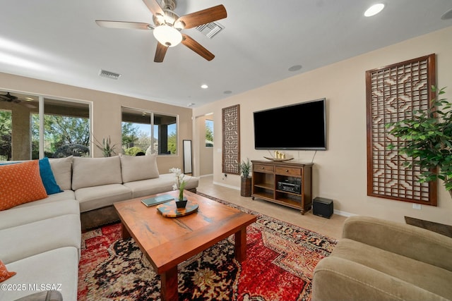 12487 N Wind Runner Pkwy, Marana, AZ 85658 - living room featuring a ceiling fan, baseboards, light tile patterned floors, and recessed lighting
