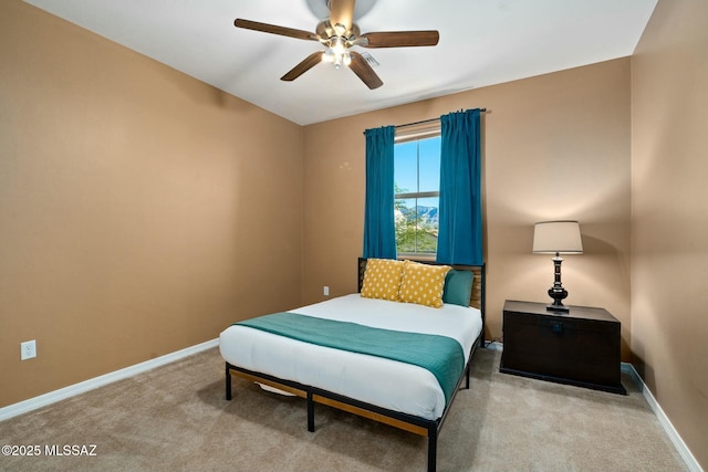 12487 N Wind Runner Pkwy, Marana, AZ 85658 - bedroom featuring carpet flooring, baseboards, and ceiling fan