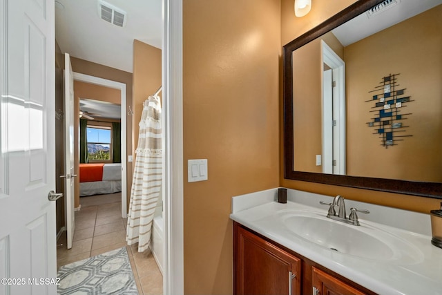 12487 N Wind Runner Pkwy, Marana, AZ 85658 - bathroom featuring vanity, tile patterned floors, and a shower with curtain