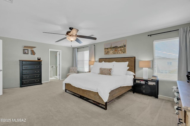 10391 E Malta St, Tucson, AZ 85747 - bedroom with baseboards, light colored carpet, ceiling fan, and visible vents