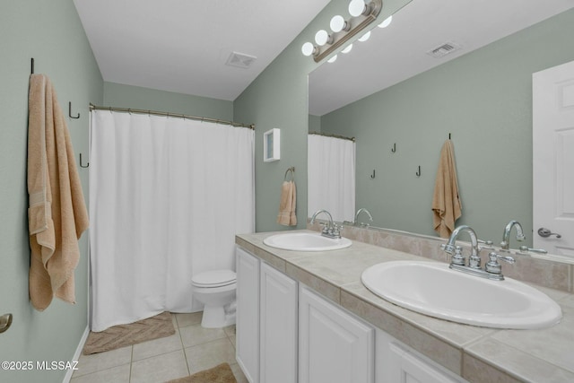 10391 E Malta St, Tucson, AZ 85747 - full bathroom with visible vents, a sink, tile patterned flooring, and double vanity