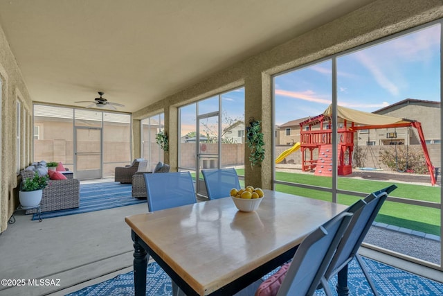 10391 E Malta St, Tucson, AZ 85747 - sunroom / solarium with a ceiling fan and outdoor dining area