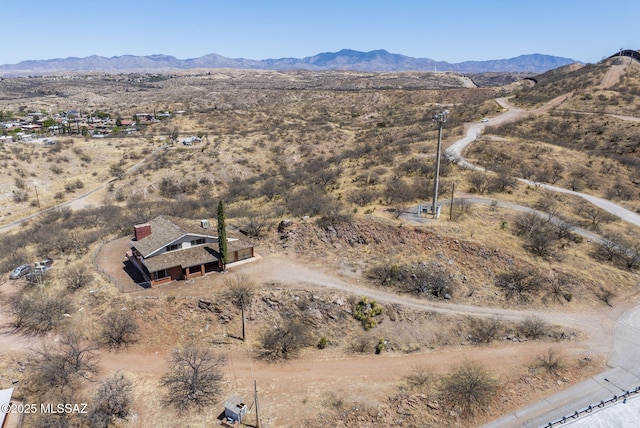 drone / aerial view with a mountain view and a desert view