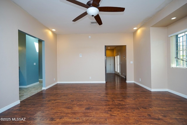 unfurnished room with wood finished floors, ceiling fan, baseboards, and recessed lighting