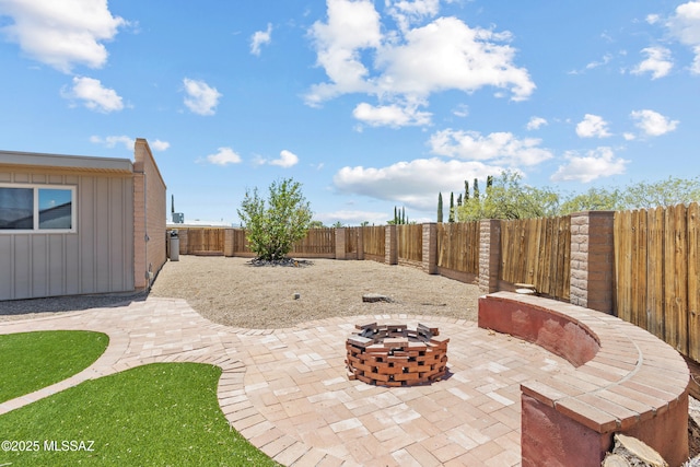 3216 S Winona Cir, Tucson, AZ 85730 - fenced backyard featuring an outdoor fire pit and a patio area