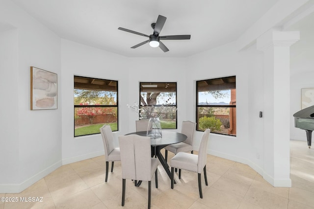 5788 E Paseo Cimarron, Tucson, AZ 85750 - dining room with decorative columns, a ceiling fan, and light tile patterned floors