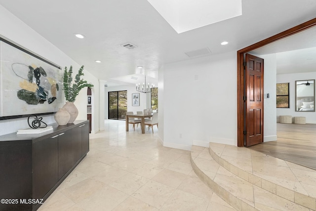5788 E Paseo Cimarron, Tucson, AZ 85750 - hallway with recessed lighting and a chandelier