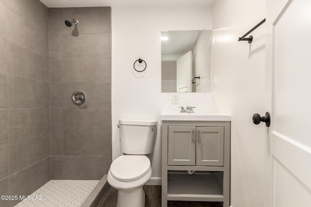 407 E 35th St, Tucson, AZ 85713 - full bathroom with vanity, toilet, and tiled shower