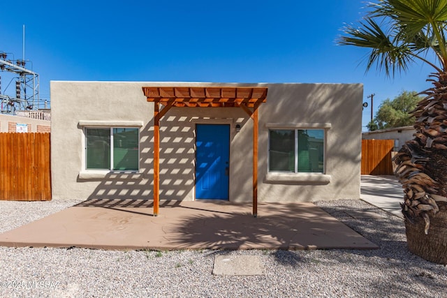 407 E 35th St, Tucson, AZ 85713 - view of front of house featuring stucco siding, fence, a patio, and a pergola