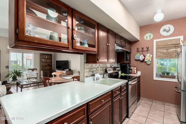 1379 W Camino Lucientes, Green Valley, AZ 85622 - dining room featuring light tile patterned flooring, a textured ceiling, and ceiling fan with notable chandelier