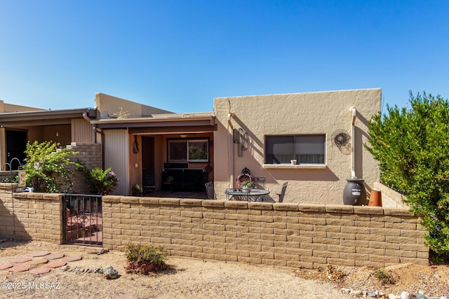 1379 W Camino Lucientes, Green Valley, AZ 85622 - view of patio featuring fence and outdoor dining space