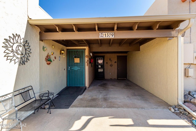 1379 W Camino Lucientes, Green Valley, AZ 85622 - back of property featuring stucco siding and a patio area