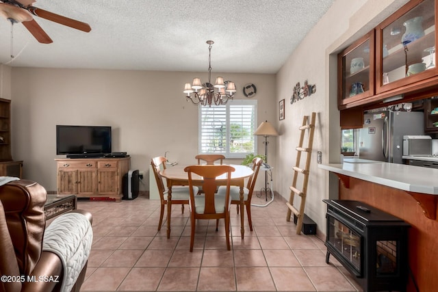 1379 W Camino Lucientes, Green Valley, AZ 85622 - living area featuring a ceiling fan, a textured ceiling, and light tile patterned flooring