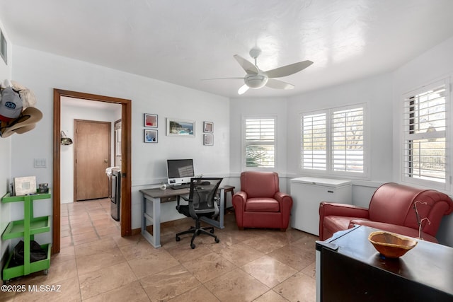 home office with a ceiling fan