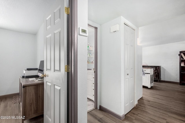 143 W Mossman Rd, Tucson, AZ 85706 - corridor with baseboards and dark wood-style floors