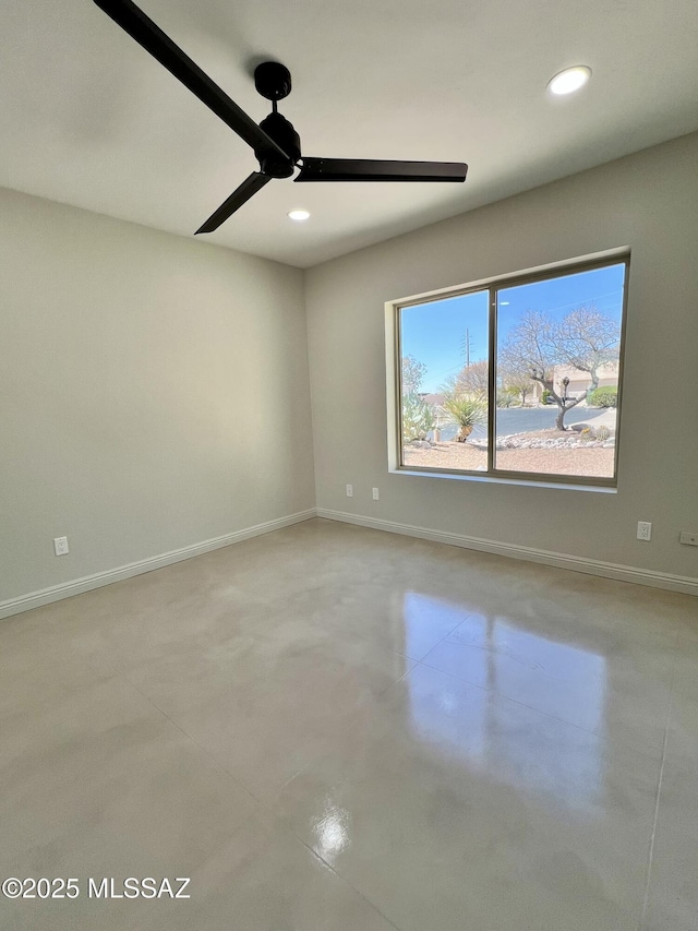 4250 E Aquarius Dr, Tucson, AZ 85718 - unfurnished room with recessed lighting, finished concrete flooring, ceiling fan, and baseboards