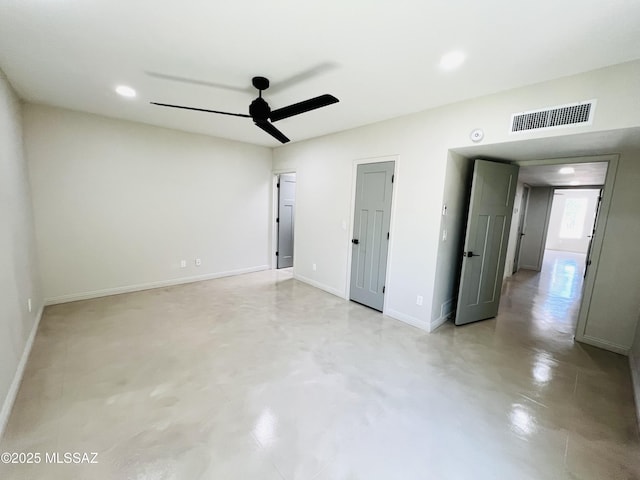 4250 E Aquarius Dr, Tucson, AZ 85718 - empty room featuring a ceiling fan, finished concrete flooring, baseboards, and recessed lighting