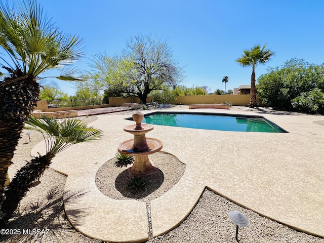 4250 E Aquarius Dr, Tucson, AZ 85718 - view of swimming pool featuring a patio area and a fenced backyard