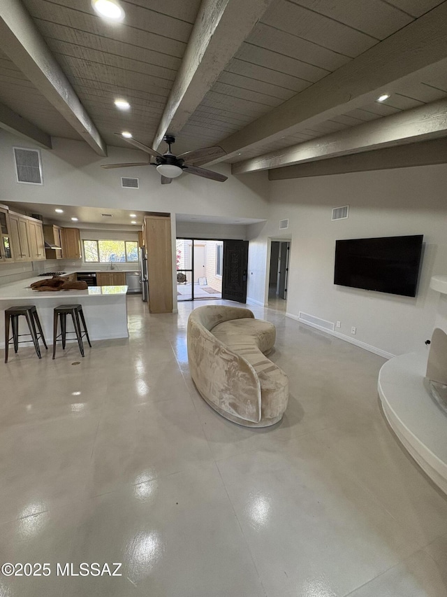 4250 E Aquarius Dr, Tucson, AZ 85718 - living room featuring beamed ceiling, recessed lighting, a ceiling fan, and baseboards