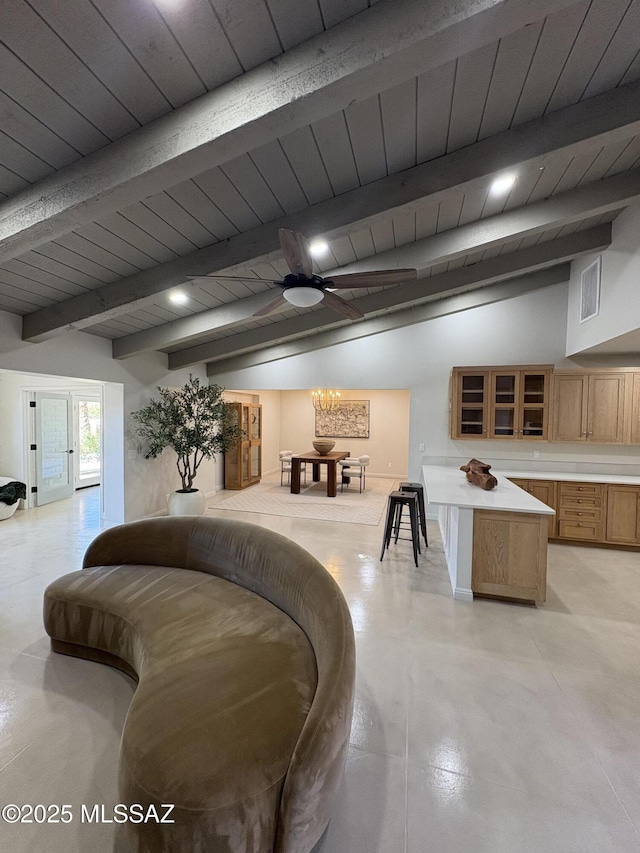 4250 E Aquarius Dr, Tucson, AZ 85718 - living room with wooden ceiling, a ceiling fan, concrete flooring, and a chandelier
