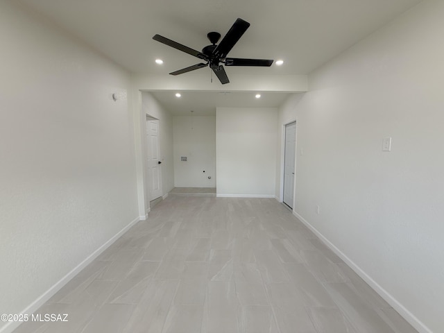 unfurnished room with baseboards, a ceiling fan, and recessed lighting