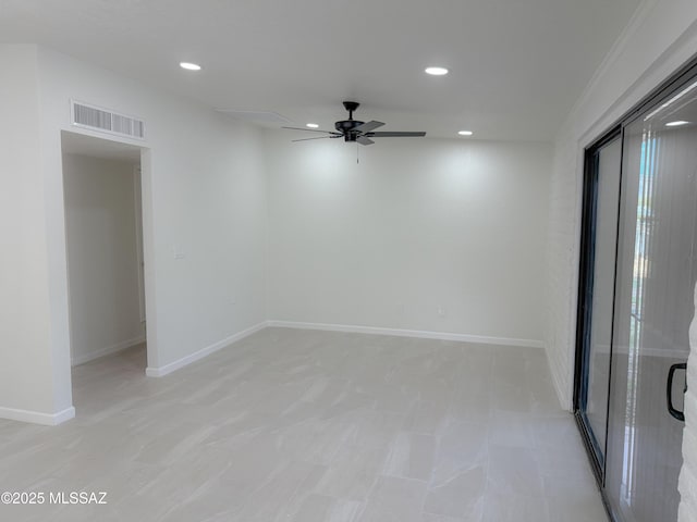 unfurnished room with baseboards, a ceiling fan, visible vents, and recessed lighting
