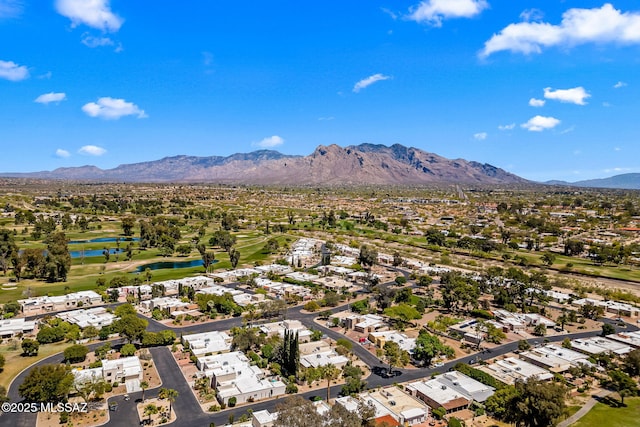birds eye view of property featuring a residential view, golf course view, and a water and mountain view