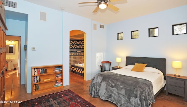 738 S Tohono Ridge Pl, Tucson, AZ 85745 - bedroom featuring arched walkways and ceiling fan