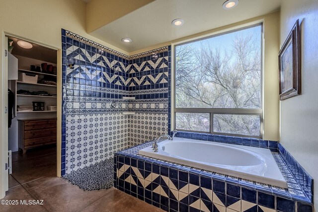 738 S Tohono Ridge Pl, Tucson, AZ 85745 - full bath featuring healthy amount of natural light, a bath, walk in shower, tile patterned floors, and recessed lighting