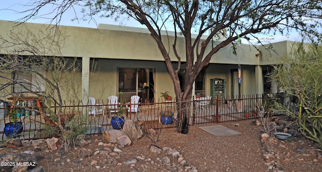738 S Tohono Ridge Pl, Tucson, AZ 85745 - view of front of home featuring stucco siding