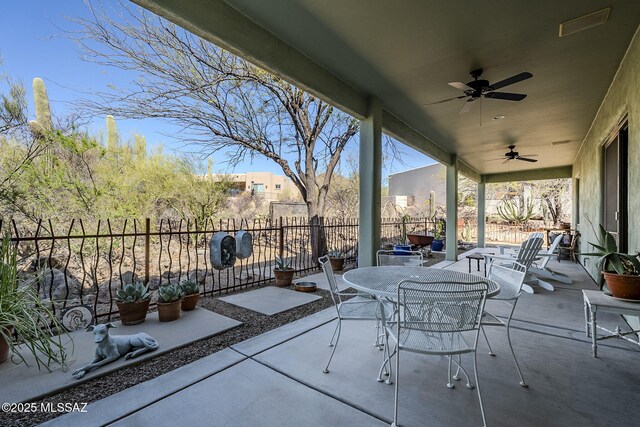 738 S Tohono Ridge Pl, Tucson, AZ 85745 - view of patio / terrace with ceiling fan and outdoor dining space