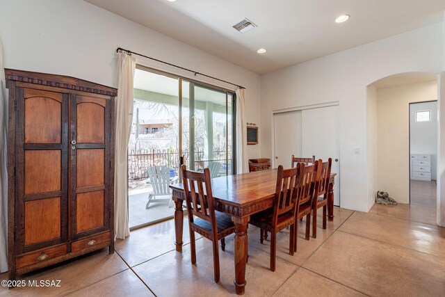 738 S Tohono Ridge Pl, Tucson, AZ 85745 - dining area with arched walkways and recessed lighting