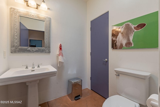 738 S Tohono Ridge Pl, Tucson, AZ 85745 - bathroom featuring toilet and a sink