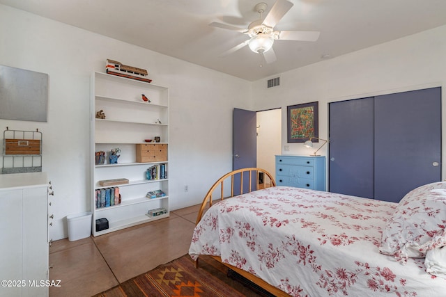 738 S Tohono Ridge Pl, Tucson, AZ 85745 - bedroom with a closet, a ceiling fan, and wood finished floors