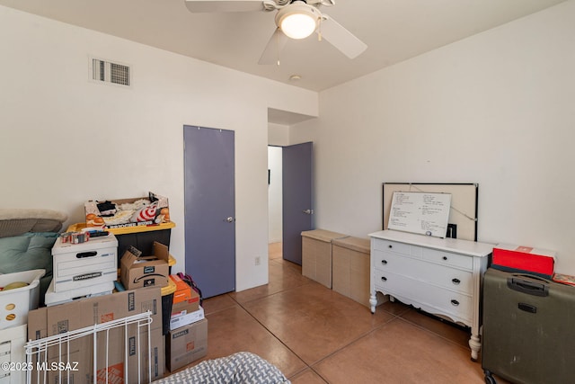 738 S Tohono Ridge Pl, Tucson, AZ 85745 - bedroom with light tile patterned flooring and a ceiling fan