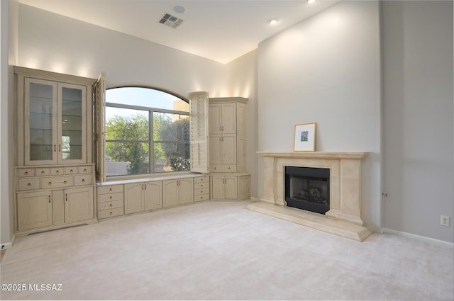 37717 S Terrace Park Dr, Saddlebrooke, AZ 85739 - unfurnished living room featuring light carpet, a fireplace, baseboards, and recessed lighting