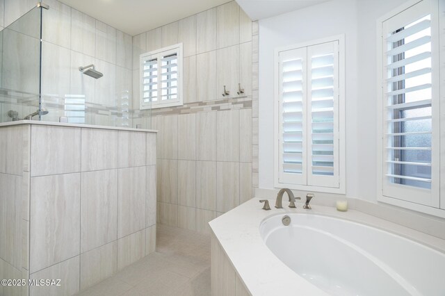 37717 S Terrace Park Dr, Saddlebrooke, AZ 85739 - full bathroom with a walk in shower, plenty of natural light, a bath, and tile patterned flooring
