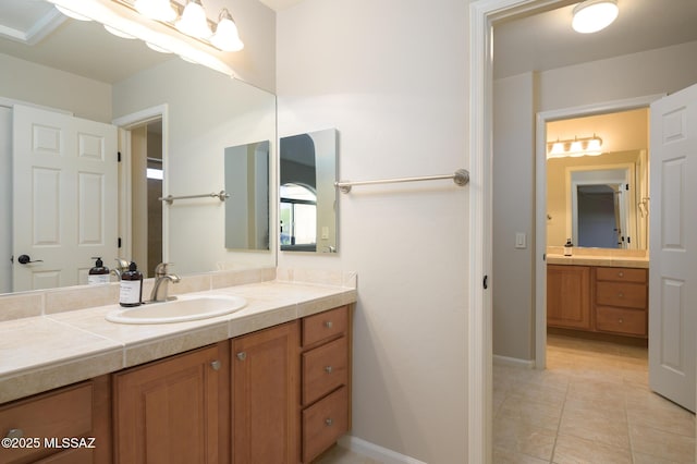 37717 S Terrace Park Dr, Saddlebrooke, AZ 85739 - bathroom with vanity, tile patterned floors, and baseboards