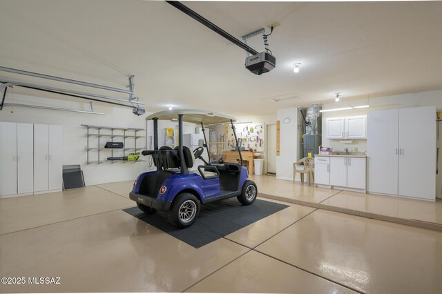 37717 S Terrace Park Dr, Saddlebrooke, AZ 85739 - garage with a garage door opener, a sink, and heating unit