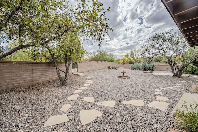 view of yard with a fenced backyard