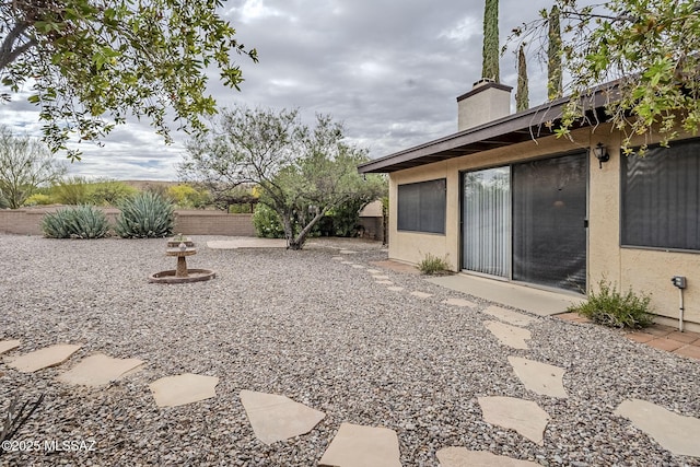 view of yard with a patio and fence