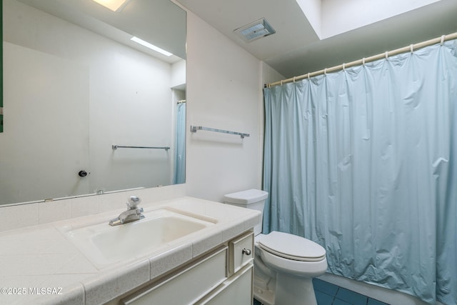 bathroom featuring tile patterned flooring, a shower with shower curtain, toilet, vanity, and visible vents