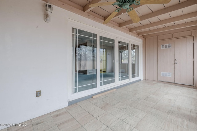 exterior space featuring visible vents and a ceiling fan