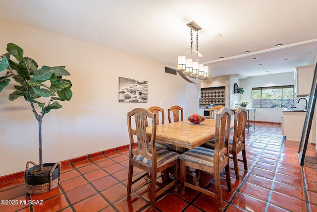 4401 E Havasu Rd, Tucson, AZ 85718 - tiled dining space with a sink and visible vents