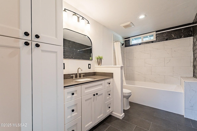 4401 E Havasu Rd, Tucson, AZ 85718 - bathroom with vanity, tile patterned floors, toilet, visible vents, and shower / bath combo with shower curtain
